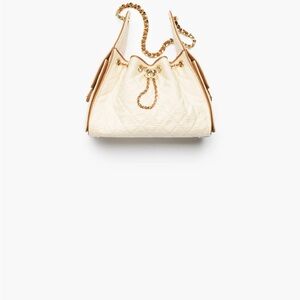 CHANEL Cream Quilted Drawstring Shoulder Bag with Gold Chain